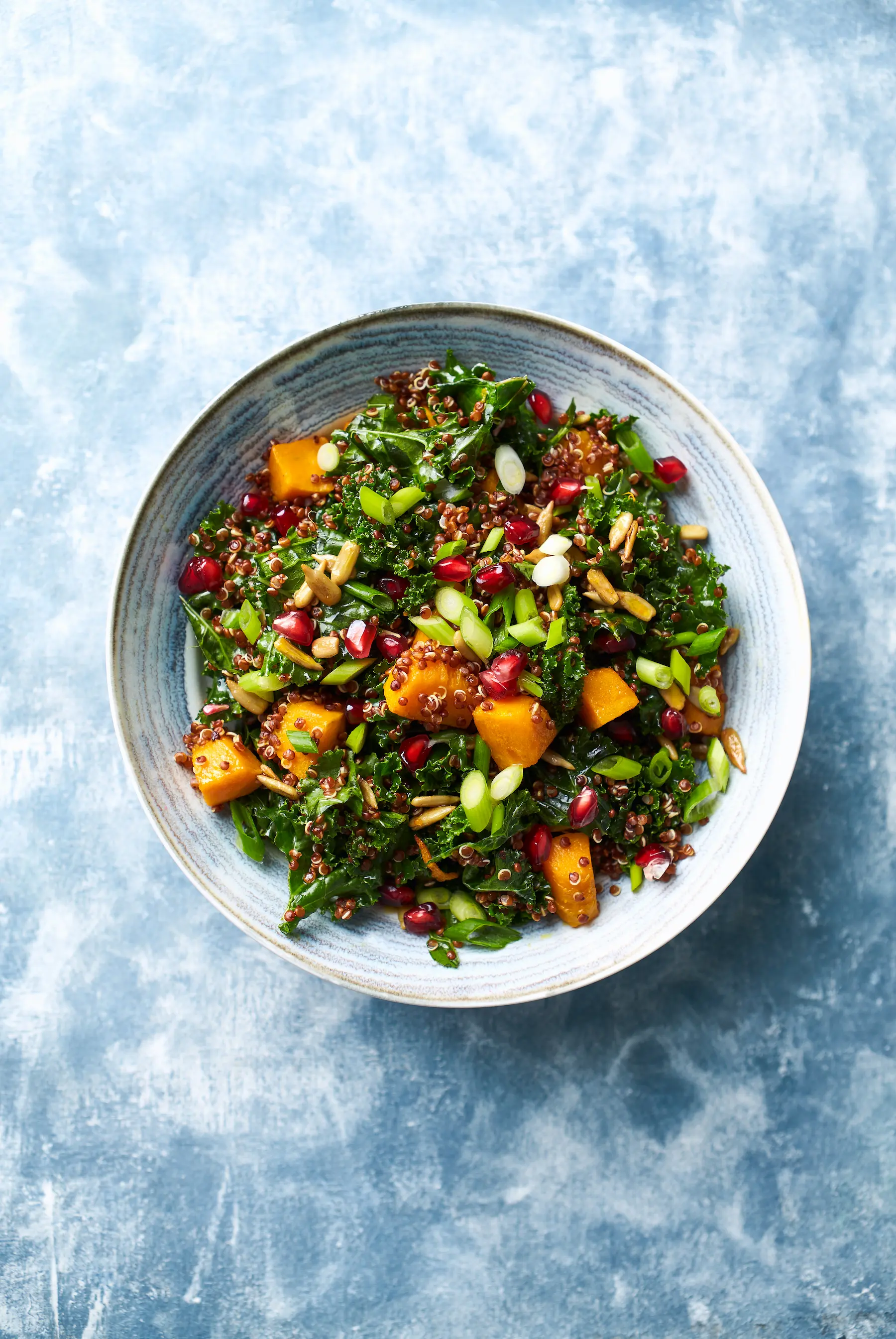 Kale, quinoa, and roasted squash wellness bowl