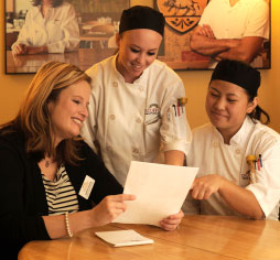 Our friendly Career Services department staff member meeting with students