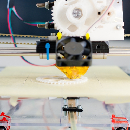 3-D printers allow for repetitious creation of intricate designs for both plastic and food items. Major companies are making and modifying the devices to fit their individual culinary needs.