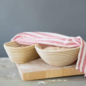 When letting bread dough rise, be sure to set the mix in a warm place and cover it with a hot towel. This will speed up the rising process.