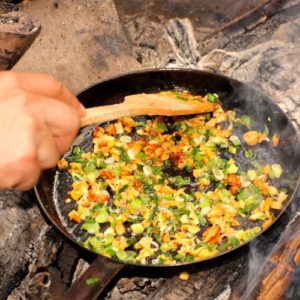 Cooking in the backwoods can be quite the task. Consider bringing a stove incase it rains and you're unable to build a fire.