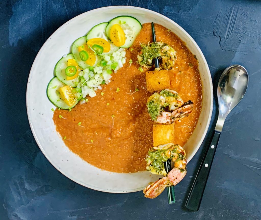 Gazpacho in a white bowl with a blue background, Rhonda Adkins