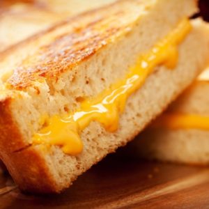 The packaging made by Eco-Products helps ensure grilled cheese arrives hot and crispy.