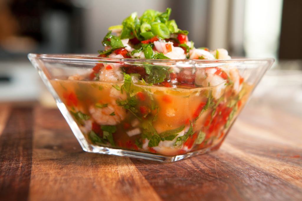 In ceviche, different types of fish is cooked using the acid of lemon and or lime. 