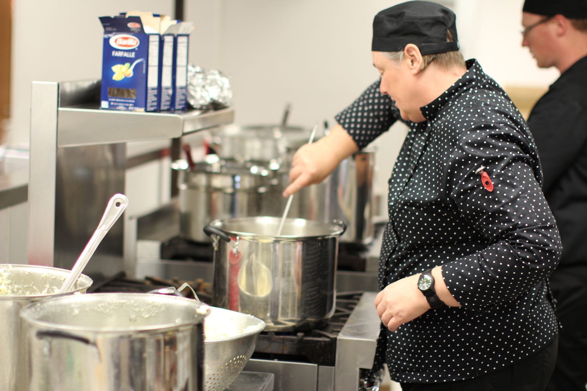 Escoffier student Kristen Douglas preparing food for her catering company, The Main Event.