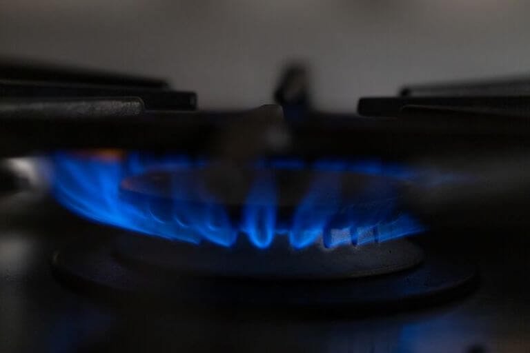 Close up of the blue flame on a stover burner
