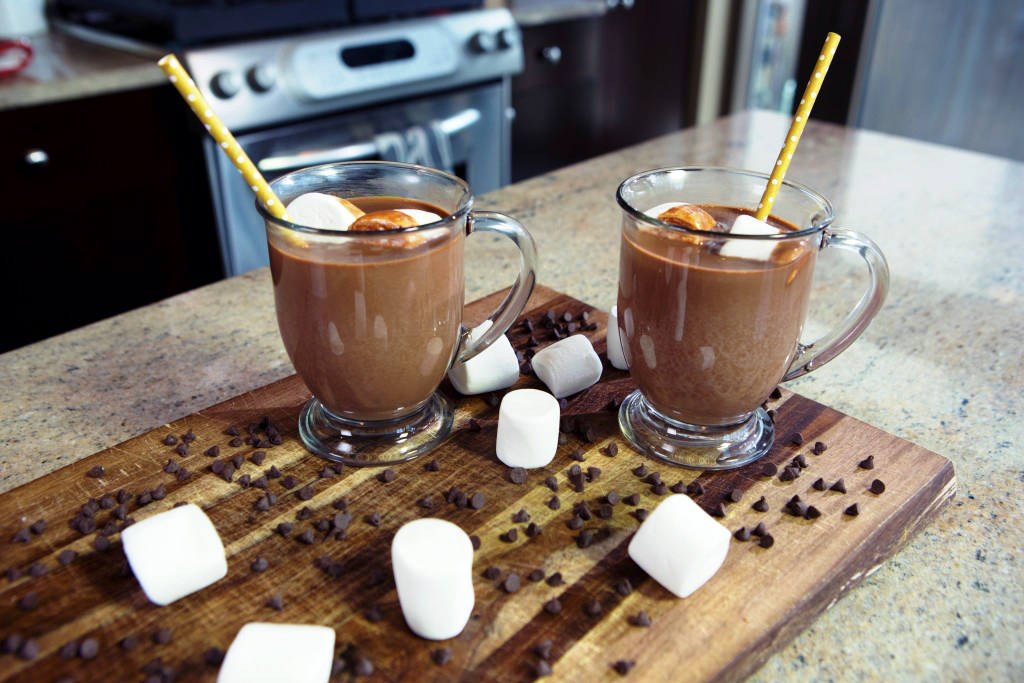 Garnish with a fun straw, marshmallows and chocolate chips. 