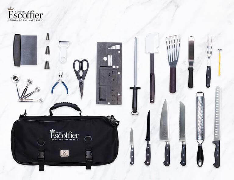 Flatlay image of the items included in a Escoffier culinary toolkit