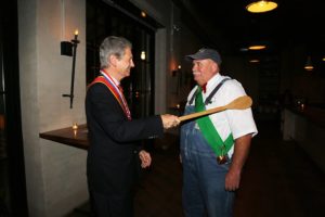 Farmer Lee Jones of Chef's Garden being inducted by Michel Escoffier