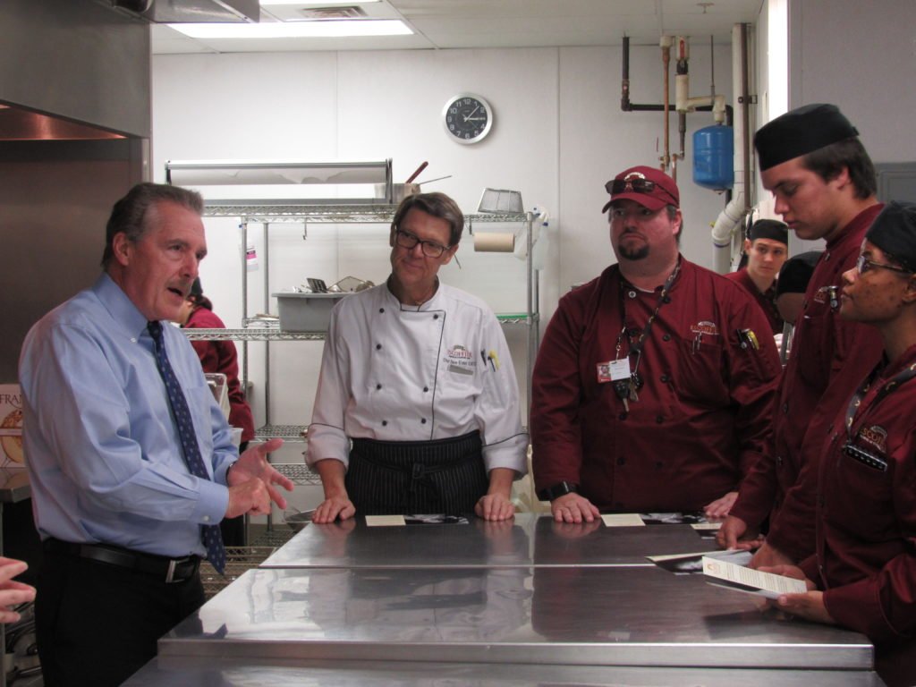 Jack Larson, the school's founder, observed classes of the culinary and pastry arts students. 