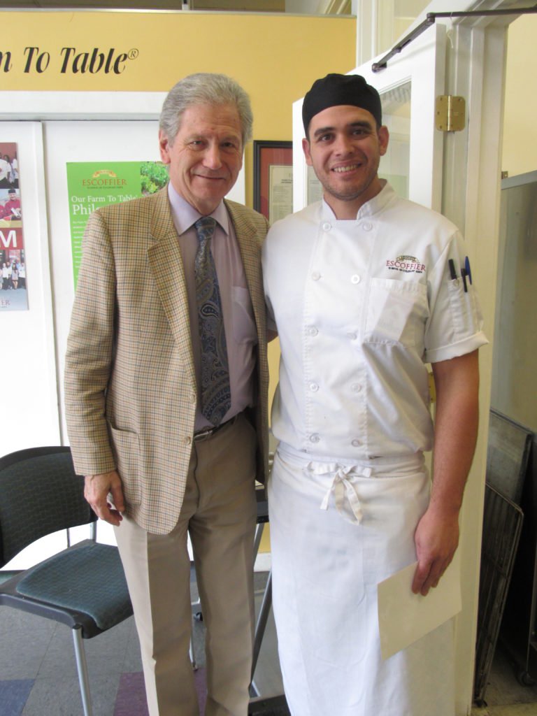 Michel Escoffier and Alexander Iverson, a student with Auguste Escoffier School of Culinary Arts-Boulder. 