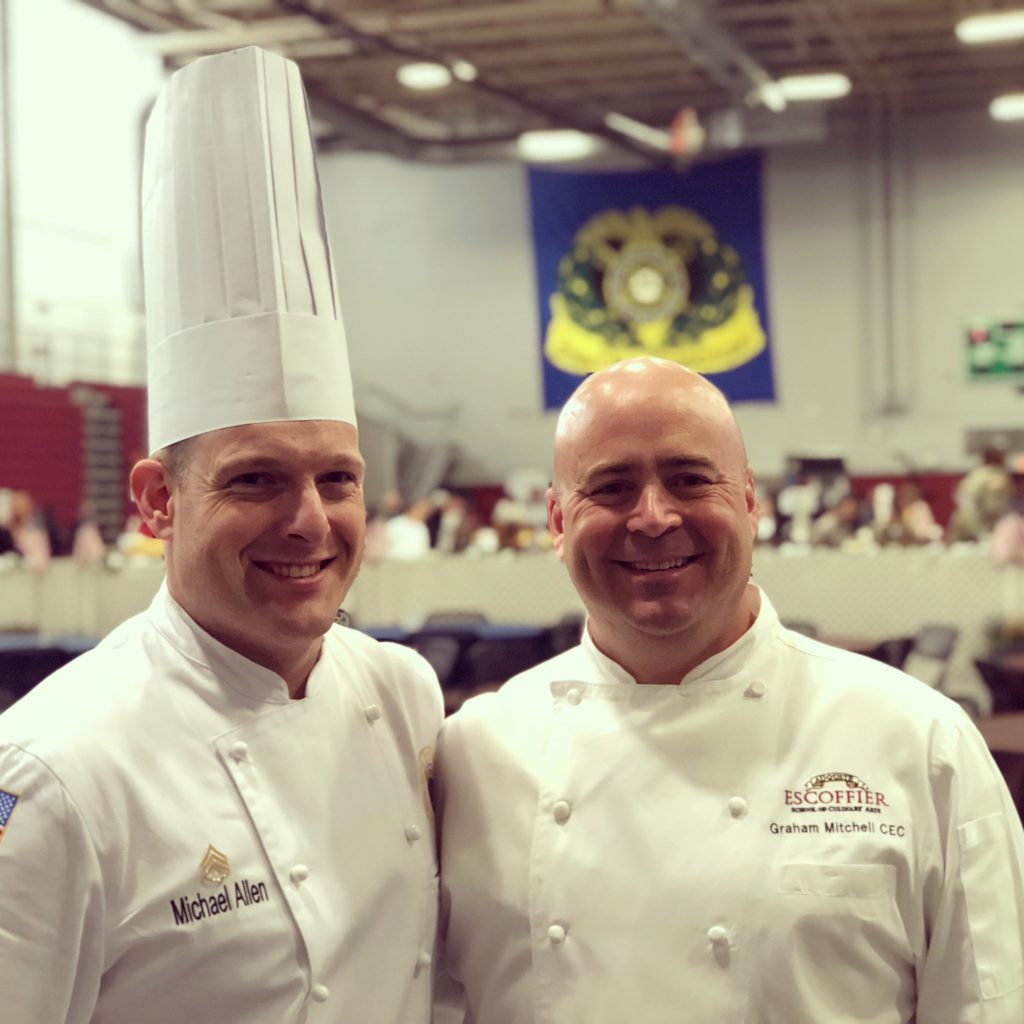 Staff sergeant Michael Allen, pictured with Escoffier Schools Executive Chef Graham Mitchell, is a graduate of the online culinary arts program.