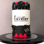 Escoffier logo cake-Black and white with red raspberries