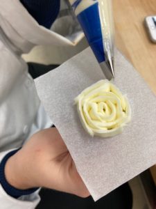 Finished buttercream rose made by pastry arts student