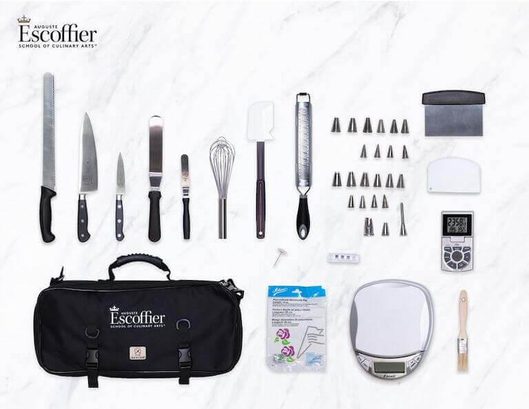 Escoffier online pastry school toolkit on a white table