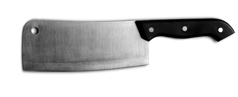 A closeup of a cleaver set against a plain white background