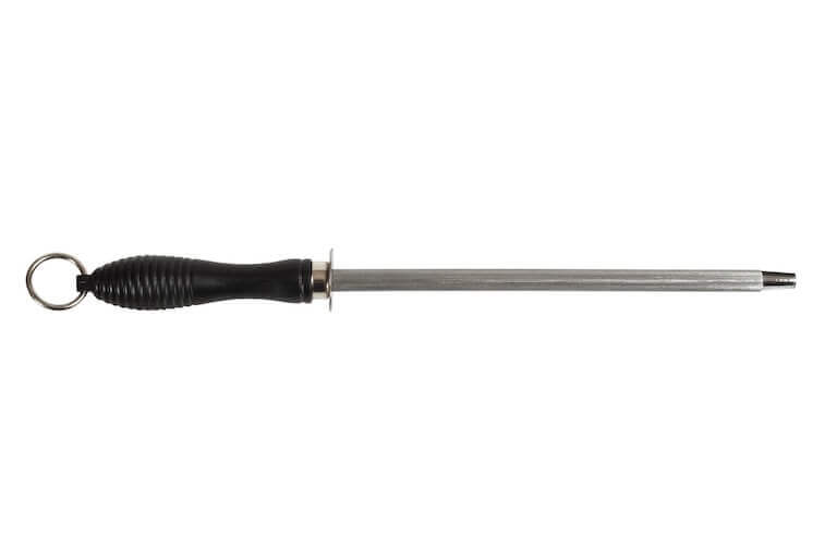 A closeup of a honing rod set against a plain white background