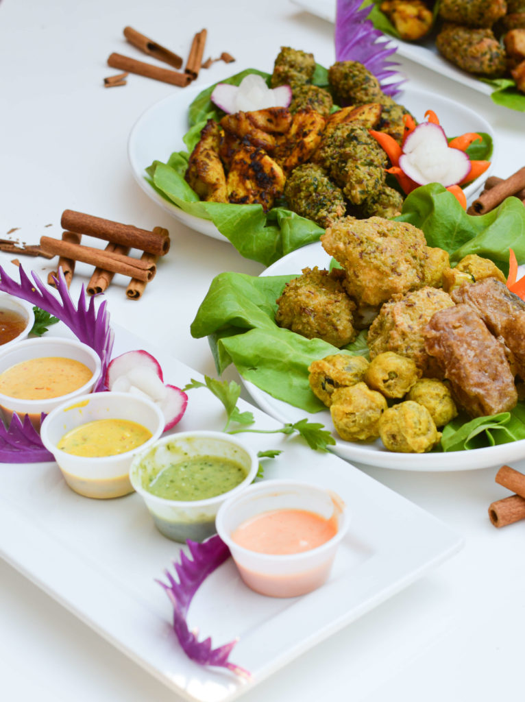 Chef Arnold Safari's Eat Zawadi menu, with sauces, chicken and fried appetizers