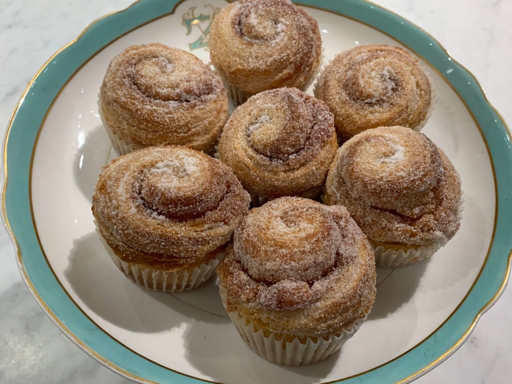 Cinnamon roll muffins on a plate