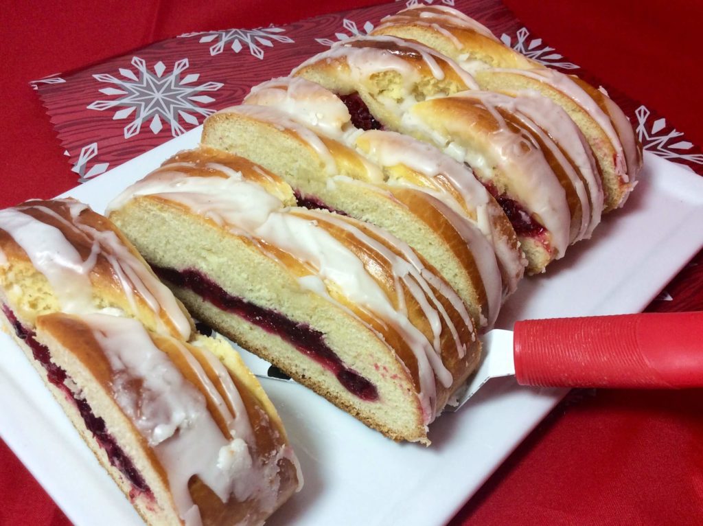 Danish pastry on a white plate and red background