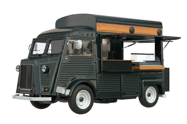 Dark green old food truck with wood panels