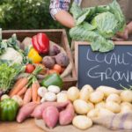 Farmer selling locally grown vegetables 