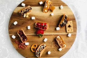 Dessert Tacos on a Round Wooden Platter