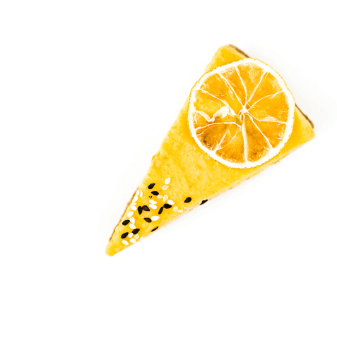 Piece of lemon pie with a slice of lemon on top