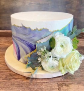 An original watercolor design cake by Chef Steve Konopelski