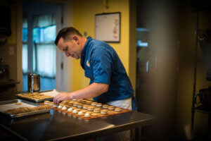 Chef Steve working on the Cannolio®. Photo by Matt Simpkins Photography 