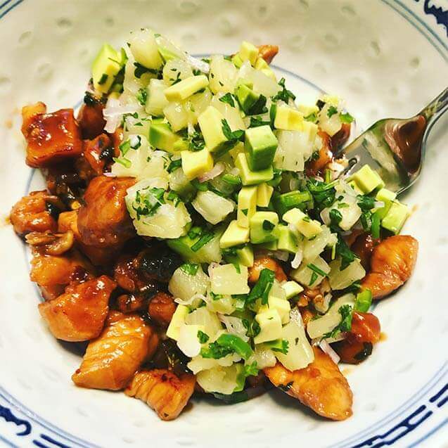 Teriyaki glazed chicken with a pineapple avocado salsa