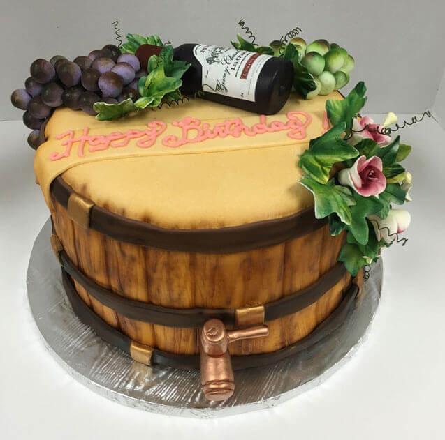 red wine barrel cake with marzipan, gumpaste, fondant and airbrush designs