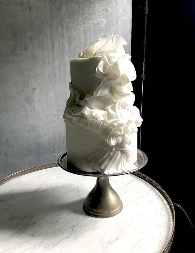 tiered white whimsy cake