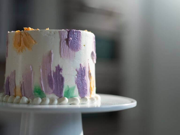 Layer cake decorated with pastel colors