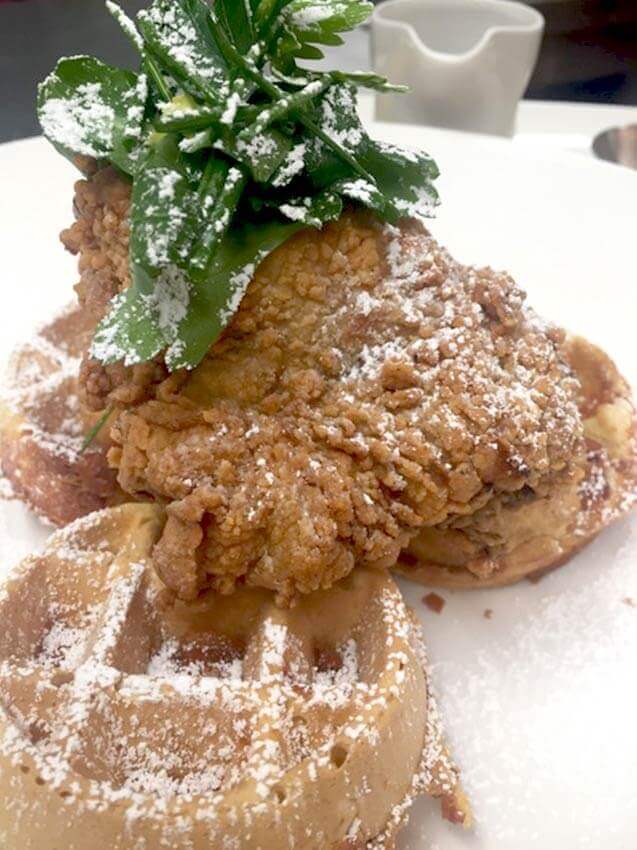Classic buttermilk fried chicken with sour dough waffles and Maple Powdered Sugar