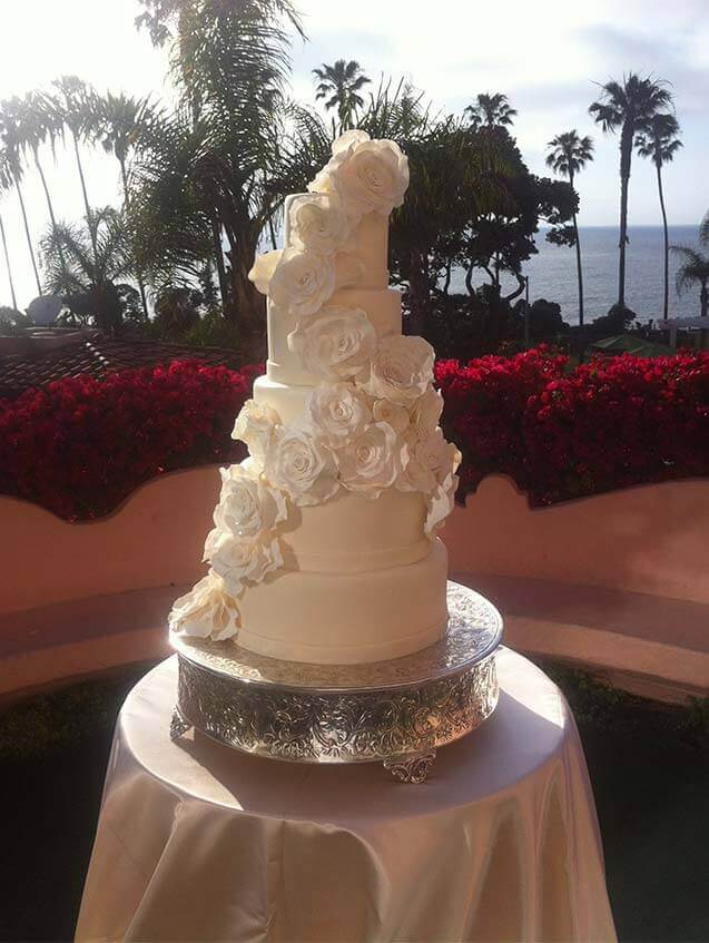 5 tiered fondant covered wedding cake with hand made gum paste flowers