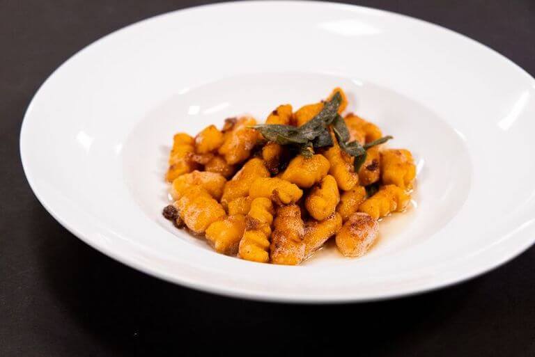 Sweet Potato Gnocchi in a white bowl