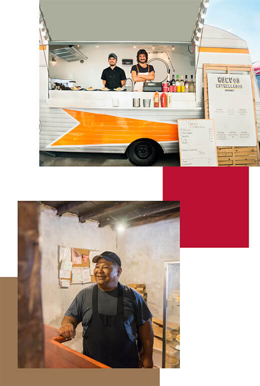 Two young men standing inside their food truck and a smiling man standing in his street kitchen