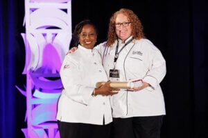 Escoffier's vice president of academic affairs, Kathleen Vossenberg with ACF president Kimberly Brock Brown