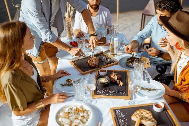 Large group of people dining at a table