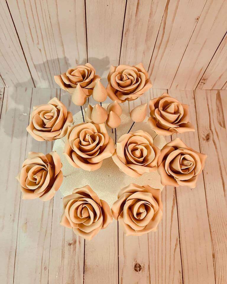 gum paste flowers sticking out of styrofoam