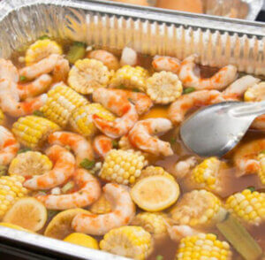 Vegan See-Food Boil with vegan shrimp, corn on the cob, celery