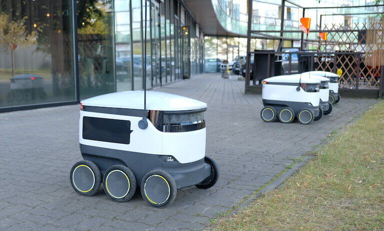 Four autonomous delivery robot outside