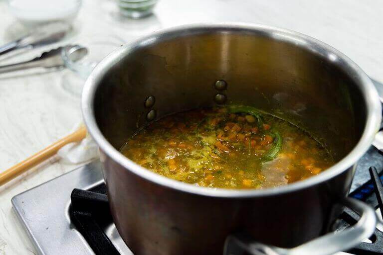 Ginger coconut chickpea soup in a pot on the stove