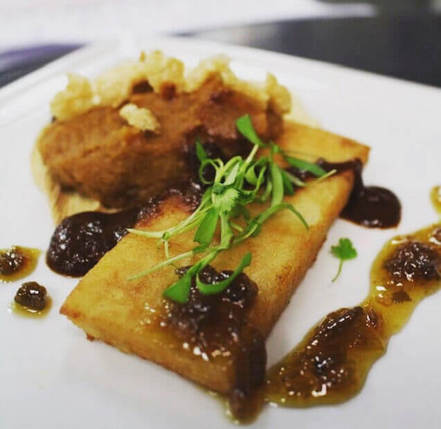 Deconstructed tamale with masa con papas, cinnamon sweet potatoes, pork rinds, chili gastrique, mole