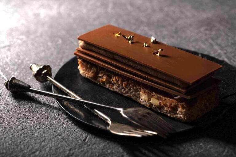 Opera cake with gold flakes on top