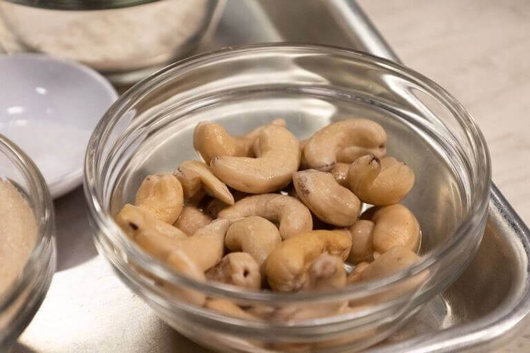 Cashews in a small glass bowl