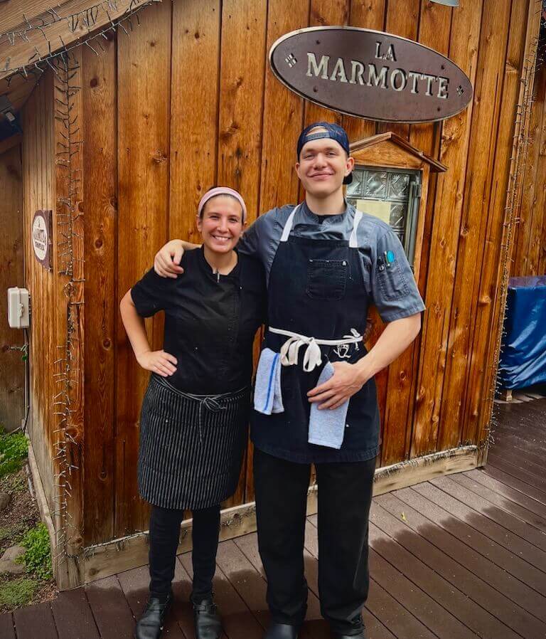 Chef Maggie and Jackson standing outside of La Marmotte