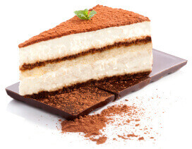 A chocolate mousse cake with cocoa dusting