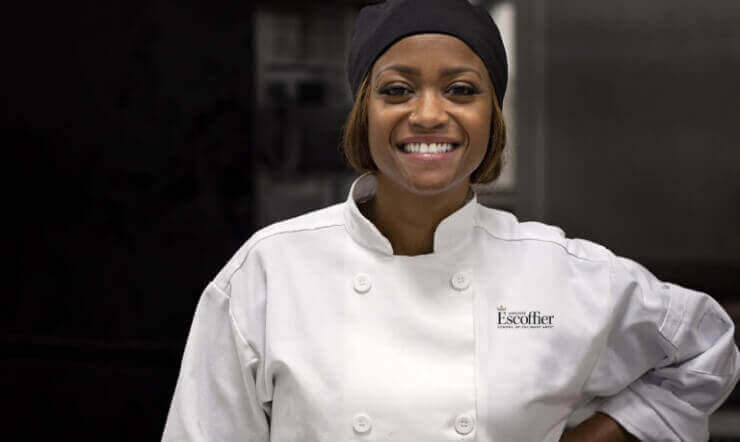 Escoffier graduate Tiffany Moore smiling at the camera